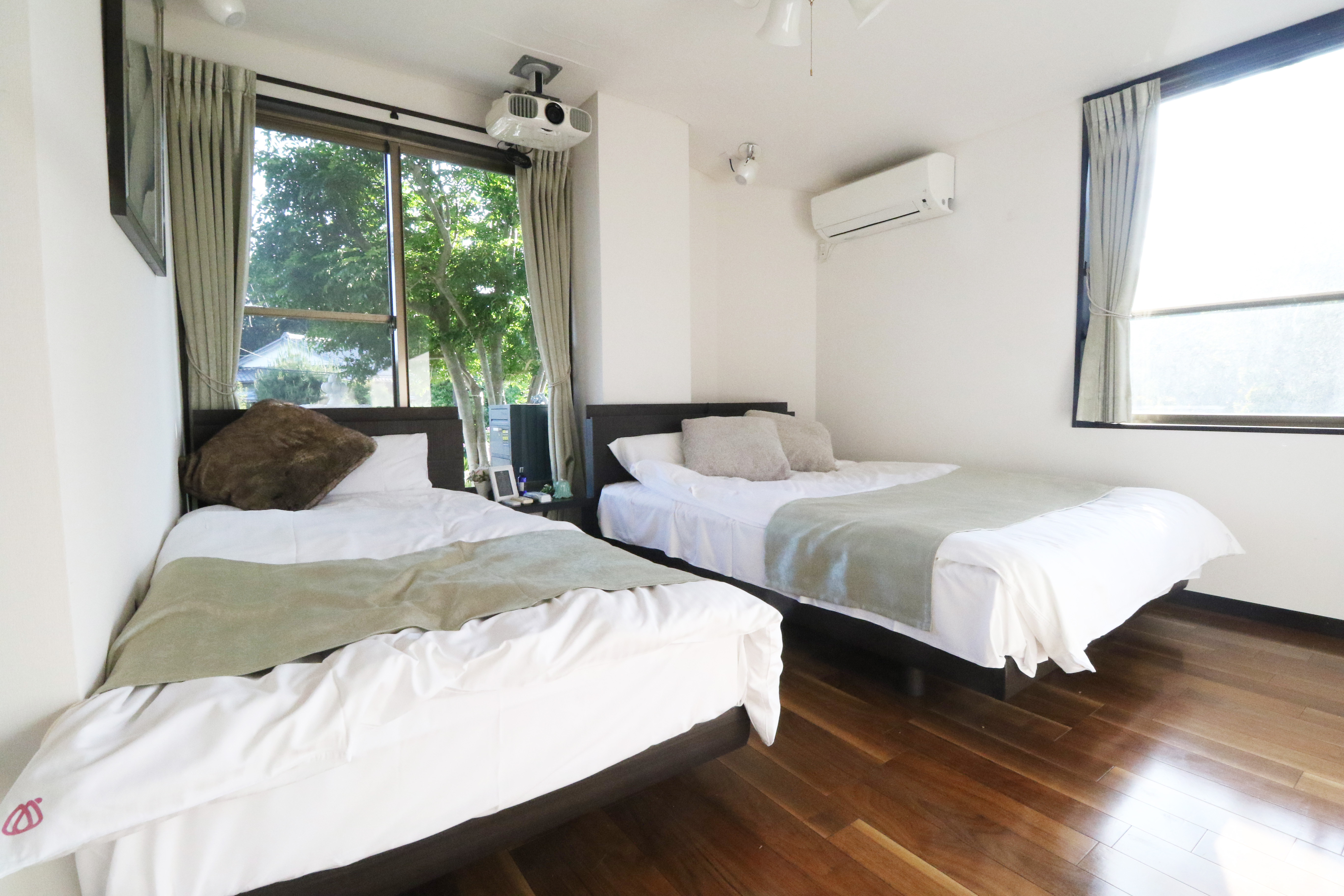 Master Bedroom with Simmons Bed & Theater Projector
